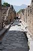 Pompeii. Gade i Pompeii med brosten  Pompeji / Pompei / Pompeii / Napoli / Campania Italien Europa  Arkologi, vulkaner, vulkanudbrud, pyroplastisk flow, pyroplasma, Vesuvius, Vesuv, naturkatastrofer, turistsevrdigheder, sevrdigheder, turisme, Romerriget, romerne, ruiner, ruinbyer