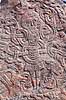 Jellingstenene. Jelling stenen med Kristus figuren foran Jelling Kirke p� kirkeg�rden  Jelling / Jylland Danmark   Jellingestenene, Jellingestenen, Jellingstenen, Harald Bl�tand, runer, runesten, religion, kristendom, kirker, kirke, Kristusfigur, Christus, UNESCO World Heritage, UNESCO Verdensarv