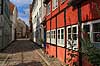 Skyttenstr�de i Helsing�r. Gamle bindingsv�rkshuse i den brostensbelagte Skyttenstr�de i Helsing�r  Helsing�r Danmark  Sev�rdigheder Stokroser, gader, byhuse